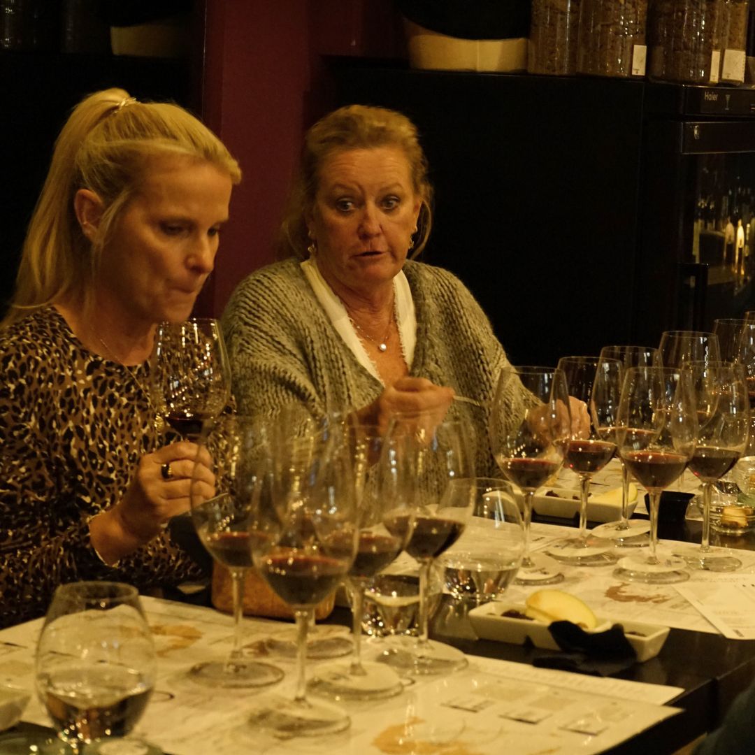 Guests tasting Greek wines during an educational wine experience.