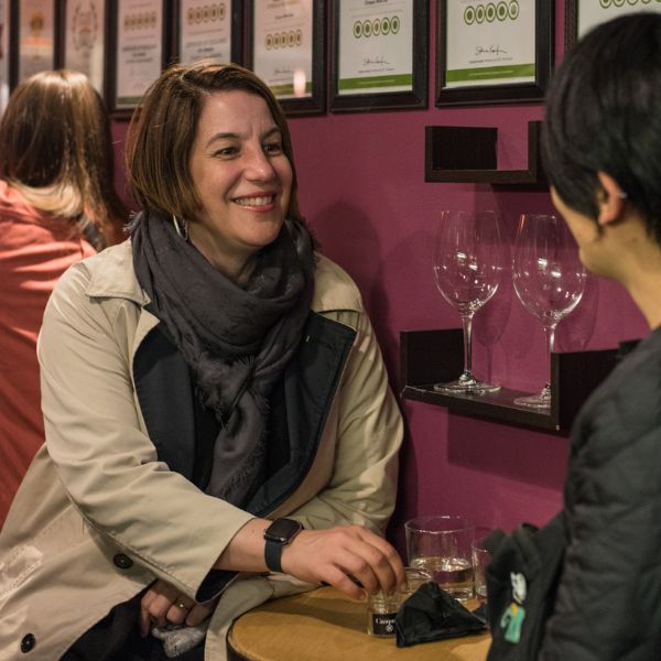 Guests enjoying a relaxed conversation at Cantina by Cinque.